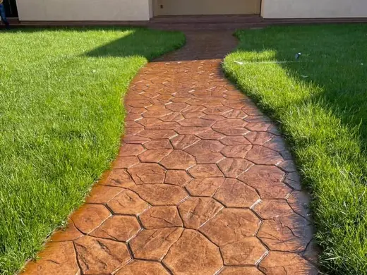 Stamped concrete in a river stone pattern with irregular stones, photo 4