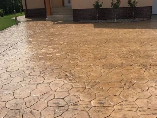Stamped concrete in a river stone pattern with irregular stones, photo 6