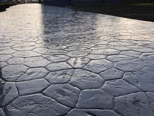 Stamped concrete in a river stone pattern with irregular stones, photo 9
