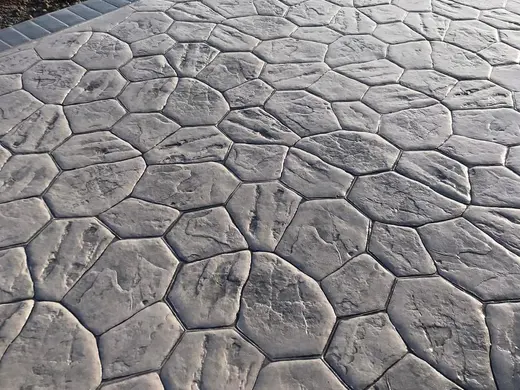 Stamped concrete in a river stone pattern with irregular stones, photo 10