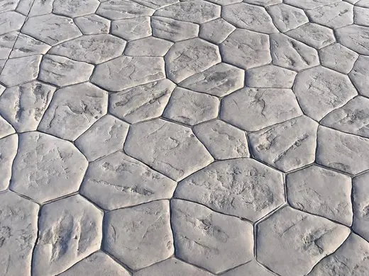 Stamped concrete in a river stone pattern with irregular stones, photo 12