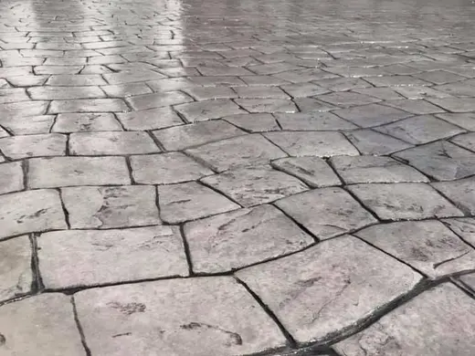 Stamped concrete in a river stone pattern with irregular stones, photo 13