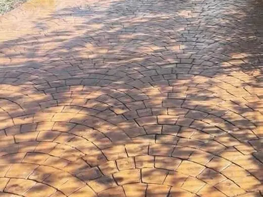 Stamped concrete in a fan cobblestone pattern, photo 17