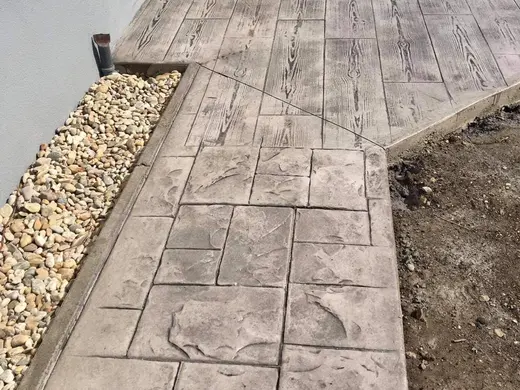 Stamped concrete in a tile pattern with pitted texture, photo 9