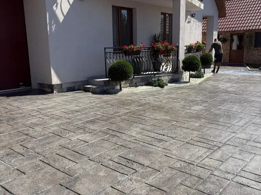 Stamped concrete in a tile pattern with pitted texture, photo 14