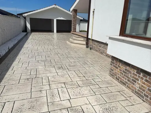 Stamped concrete in a tile pattern with pitted texture, photo 22