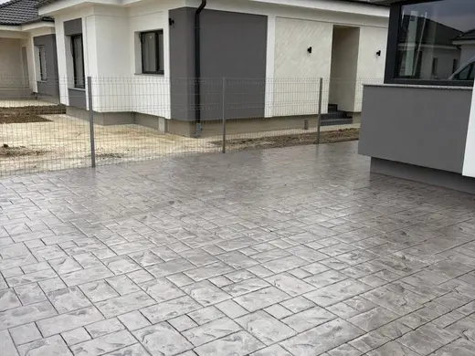 Stamped concrete in a tile pattern with pitted texture, photo 27