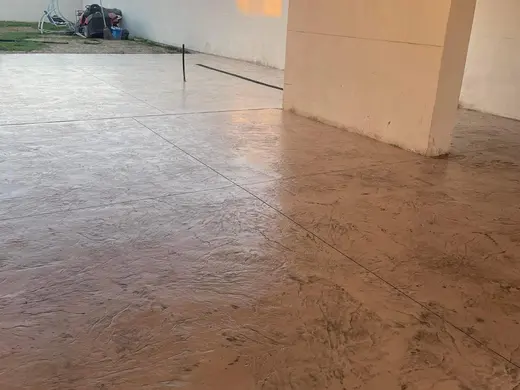 Stamped concrete with a continuous stone texture and no joints, photo 3