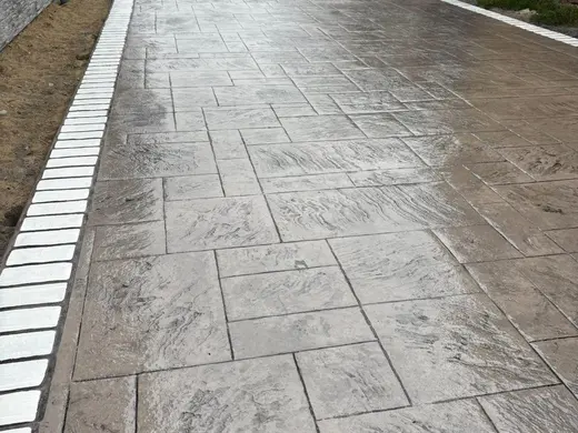 Stamped concrete in a stone slab pattern with slate texture, photo 19
