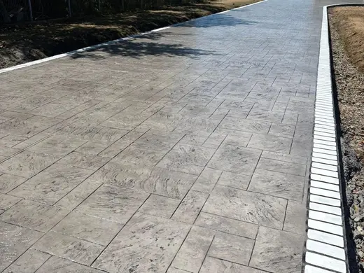 Stamped concrete in a stone slab pattern with slate texture, photo 21