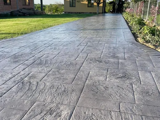 Stamped concrete in a stone slab pattern with slate texture, photo 26